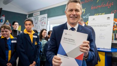 Jason Clare holds his Better and Fairer Schools Agreement two months before the 2025 federal election. Picture: Monique Harmer.