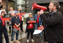 Justin Mullaly rallies with teachers during a strike. Picture: Alison Wynd.