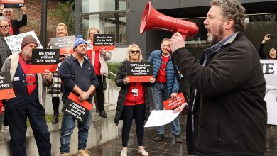Justin Mullaly rallies with teachers during a strike. Picture: Alison Wynd.