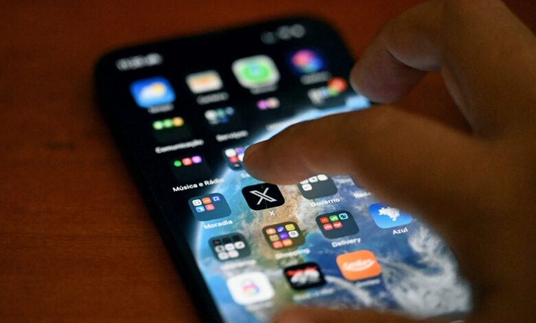 This photo illustration shows the social media platform X (former Twitter) app on a smartphone. A panel of teachers discussed the upcoming Australian social media ban at Edutech on June 12, 2025. Picture: Mauro Pimentel
