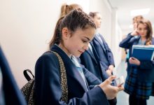 Phones, watches and earbuds will be banned from 2027. Picture: iStock/SolStock.