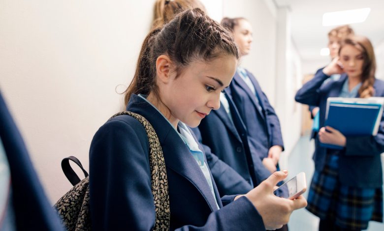 Phones, watches and earbuds will be banned from 2027. Picture: iStock/SolStock.